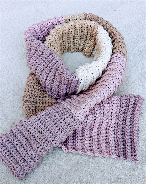 A lot of these crochet scarf patterns are great starter projects too – using basic stitches like single and double crochet – they would be perfect for a beginner project. Happy crocheting! 30 Free Crochet Scarf Patterns. Easy Double Crochet Infinity Scarf. Cozy Striped Infinity Scarf.